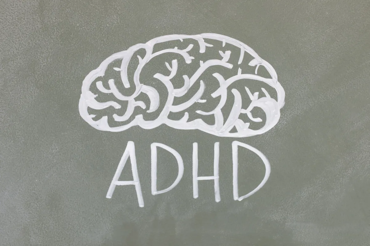 Illustration of a brain labeled with ADHD, showing neural connections.