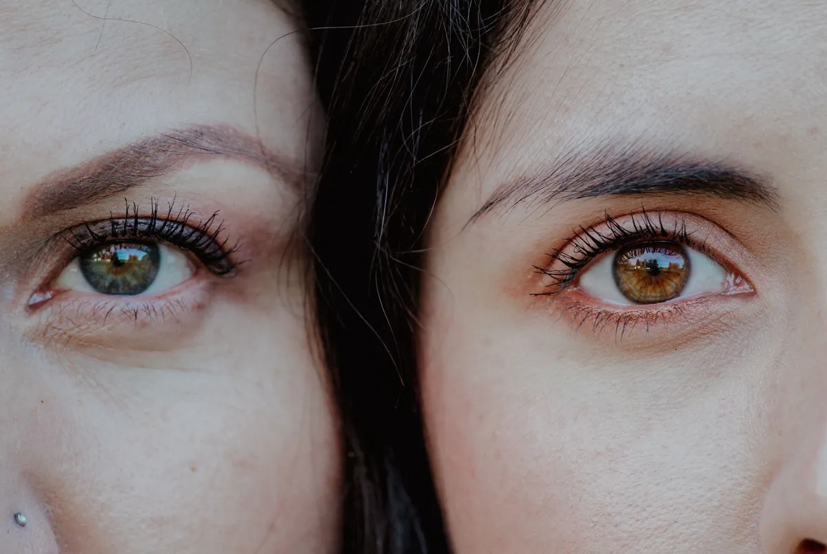 Close-up of two women’s eyes showing different brow shapes and skin textures.