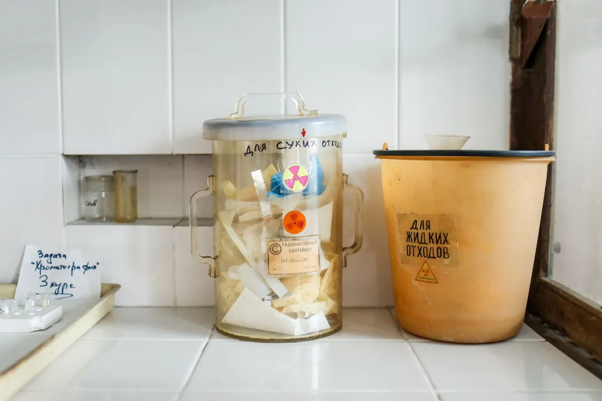 Containers for chemical waste disposal in a laboratory setting.