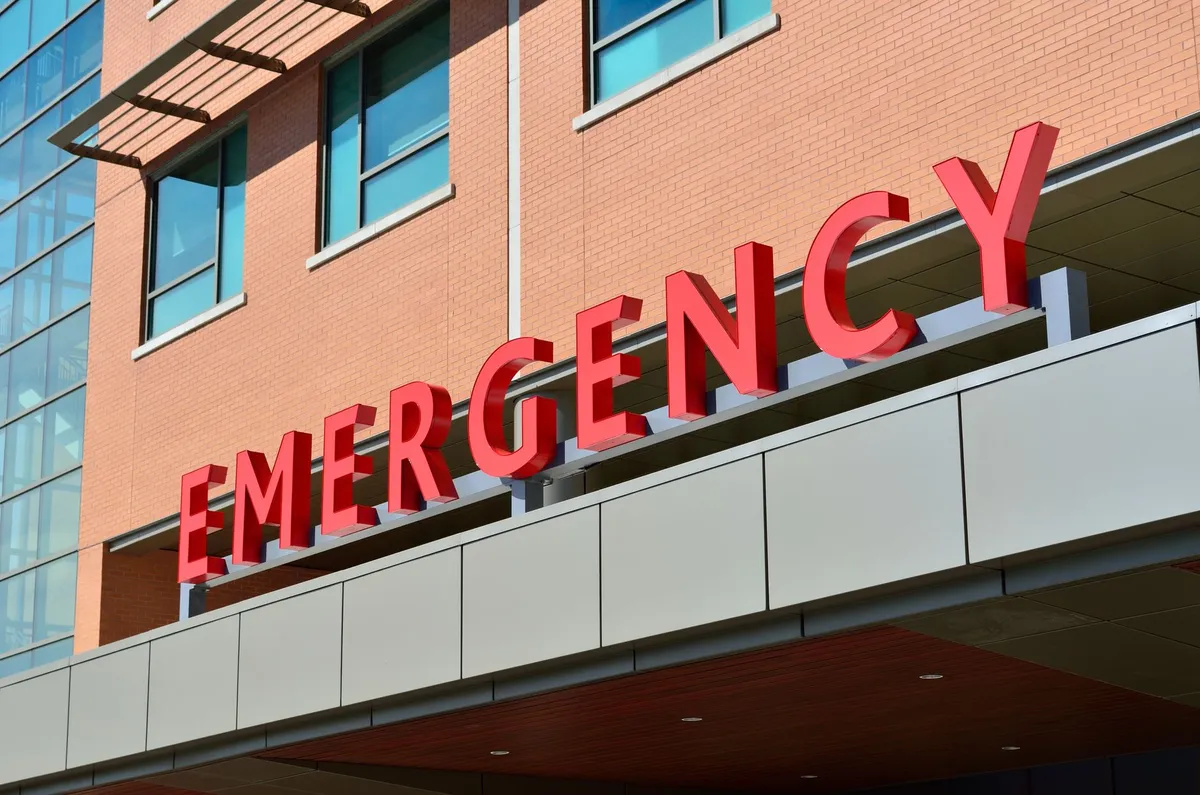 Exterior of a healthcare facility with an emergency sign in Grand Rapids.