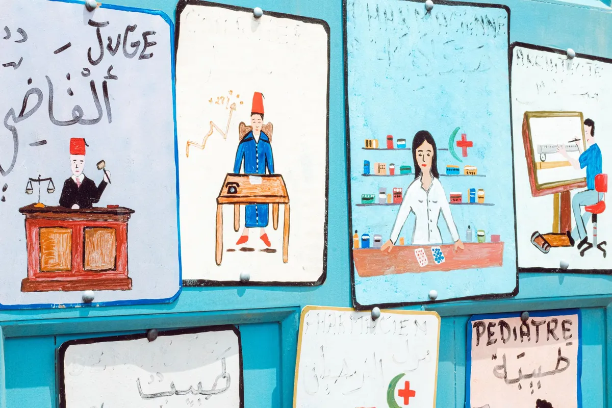 Colorful signs in multiple languages related to healthcare services.